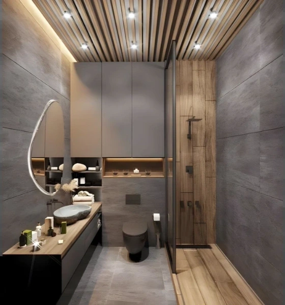 Narrow gray bathroom with a wood slat ceiling, floating vanity and glass shower